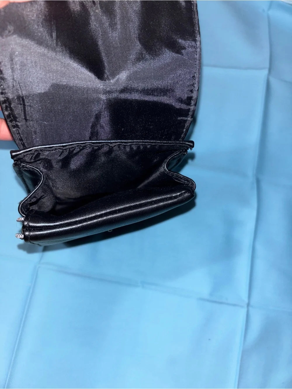 RODIER Black Leatherette Crossbody Phone Pouch with Gold Logo